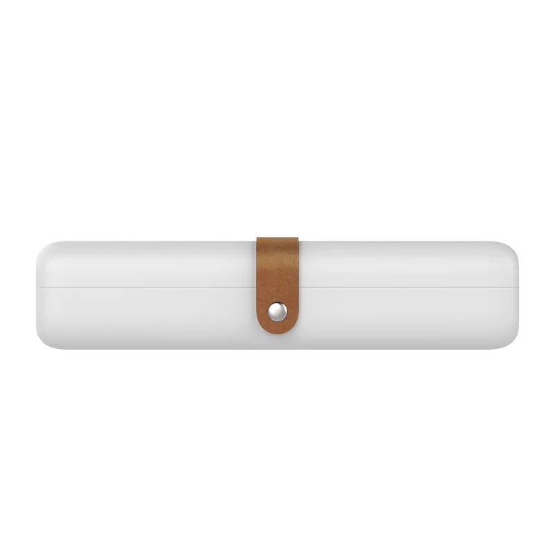 White cylindrical object with a brown strap on a white background