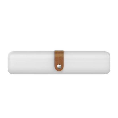 White cylindrical object with a brown strap on a white background