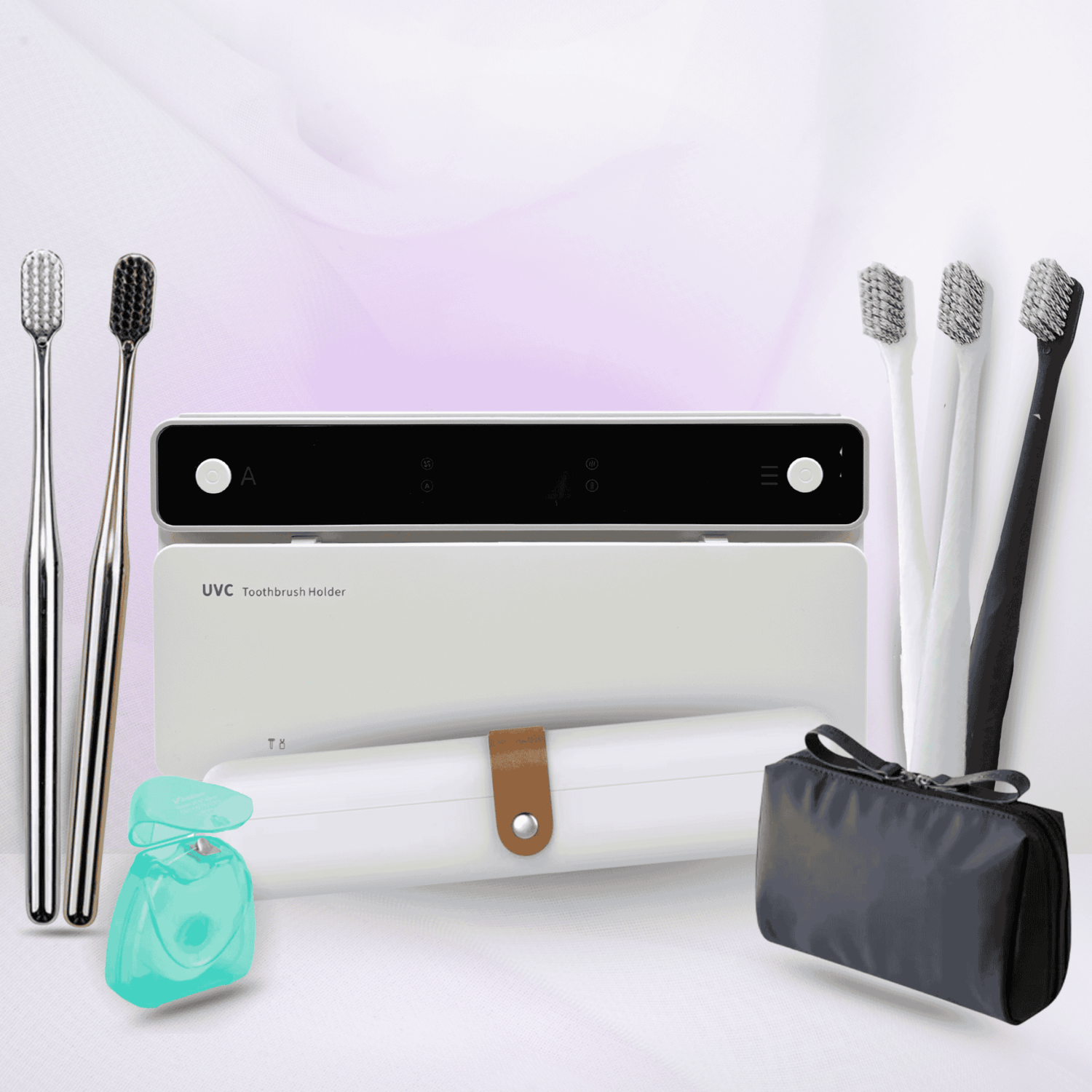 Set of UVC toothbrush holder, toothbrushes, and travel case on a light background