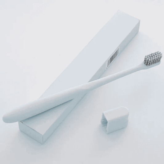 Blue toothbrush with bristle head on a white background