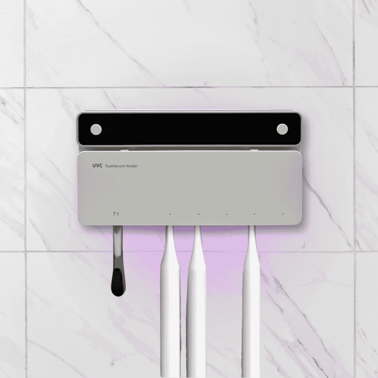 UVC toothbrush holder with UV light on a white tiled wall background