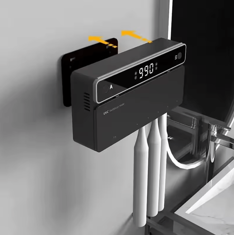 Black electronic device with digital display on a gray wall