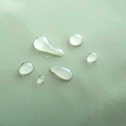 Water droplets on a textured green surface
